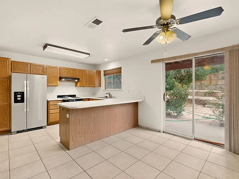 7817 Sunrose Dr NW — Photo 4