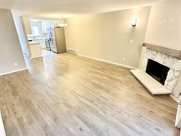 Open concept living room, dining room and kitchen