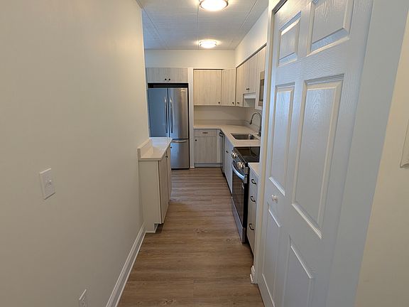 View from entry hall into kitchen
