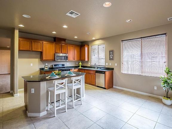 Ample Kitchen with large center island- Has drawers and cabinet space