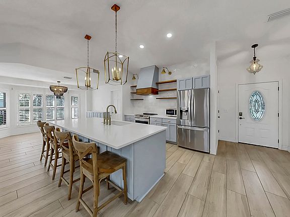 Fully renovated interior with luxury finishes.