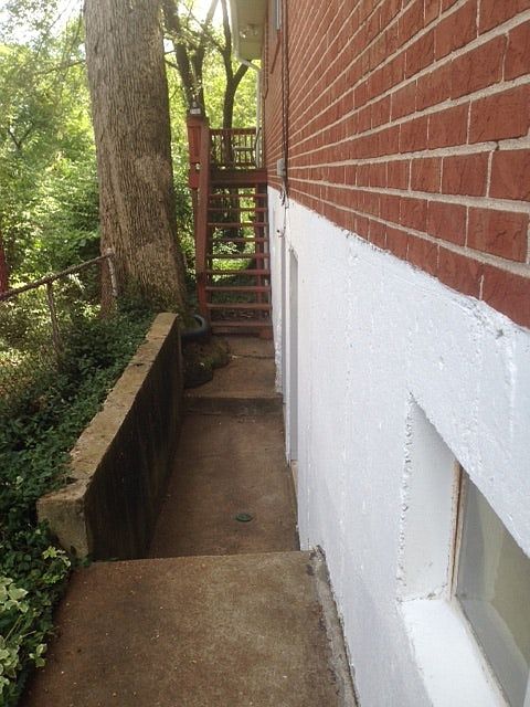 7104a is to left side of building with steps going up to uni