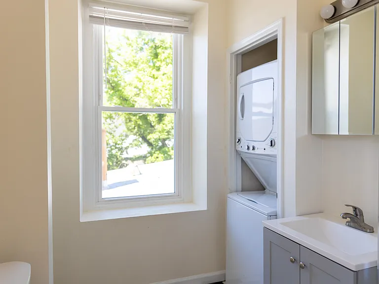 Bathroom with washer/dryer in unit