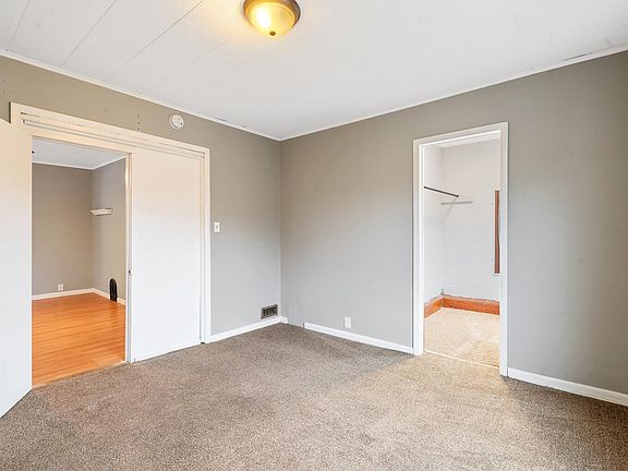 Primary bedroom with walk in closet