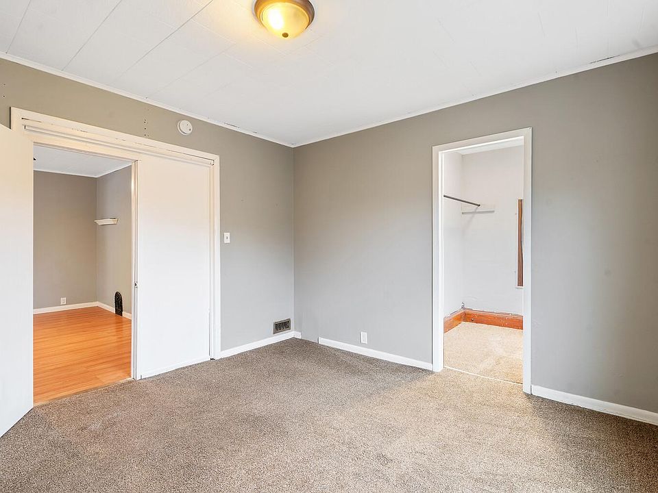 Primary bedroom with walk in closet