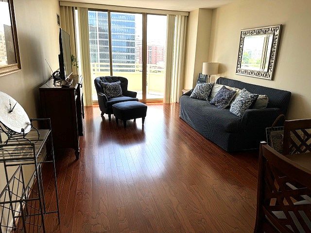 Looking from front door toward large, private east facing balcony.