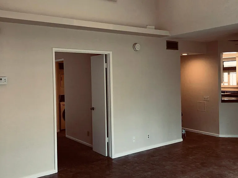 Upper window with planation shutters in Living room!