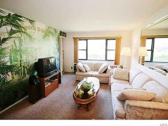 Sunny living room with door out to terrace