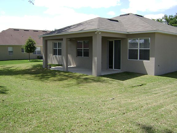 Back view with covered patio
