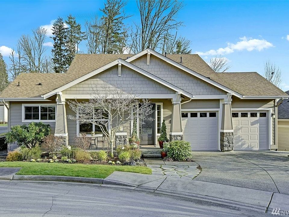 This sought after Cedar Plan is an entertainers delight! Located in The Trilogy 55+ golf course community at Redmond Ridge in a quiet cul-de-sac on a private greenbelt lot with sunny southern exposure.