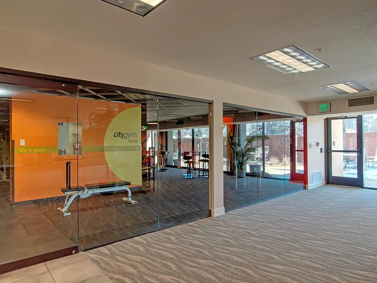 Exstensive fitness area and sauna with a walk out to community court yard.