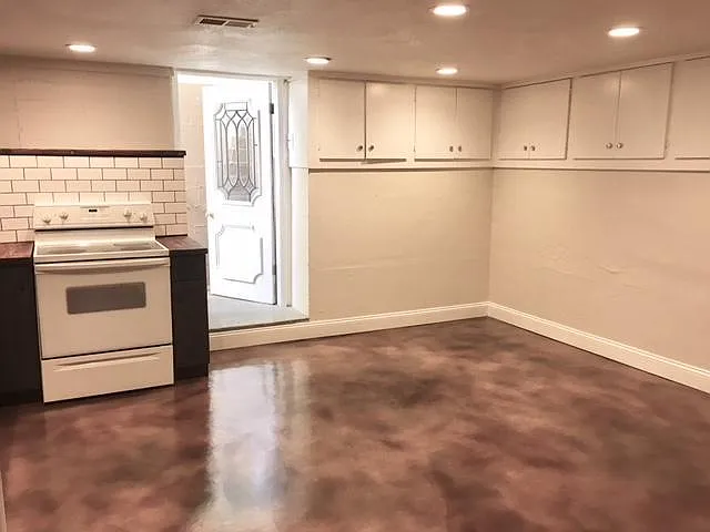 Huge eat-in kitchen with wrap around built-in storage cabinets - 2261 Newark St #B