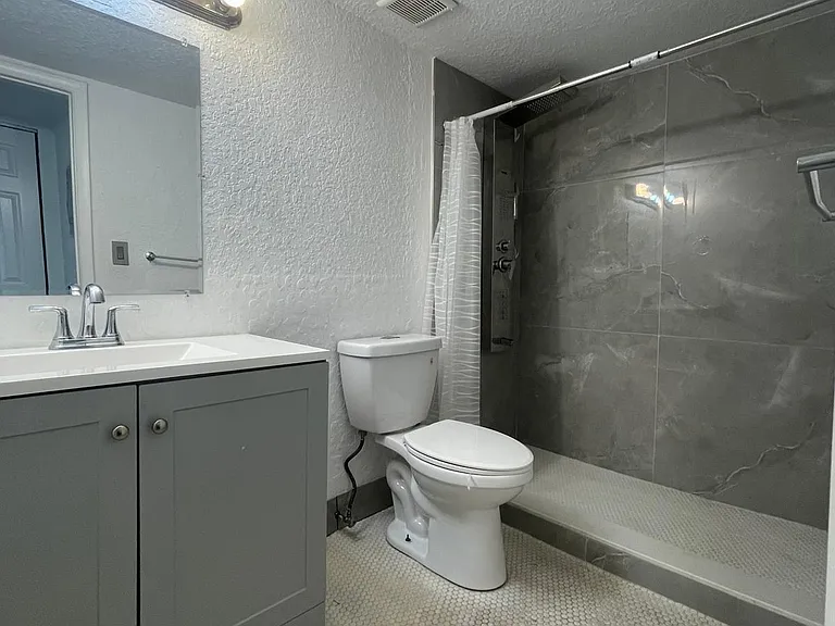 651 NW 42nd Ct #118 — Photo 17