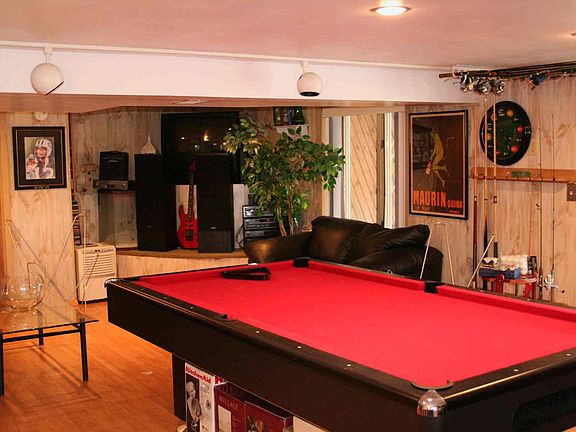 This large room provides more room for fun, and sliders open to the lower deck