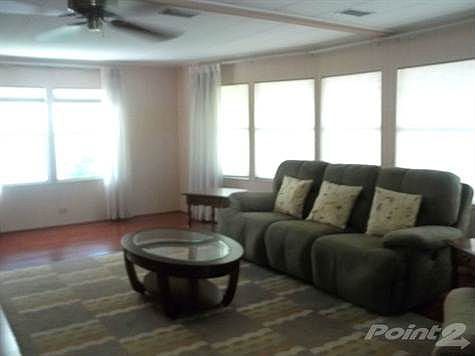 LIVING ROOM W RECLINING SOFA, RETRACTABLE SHADES