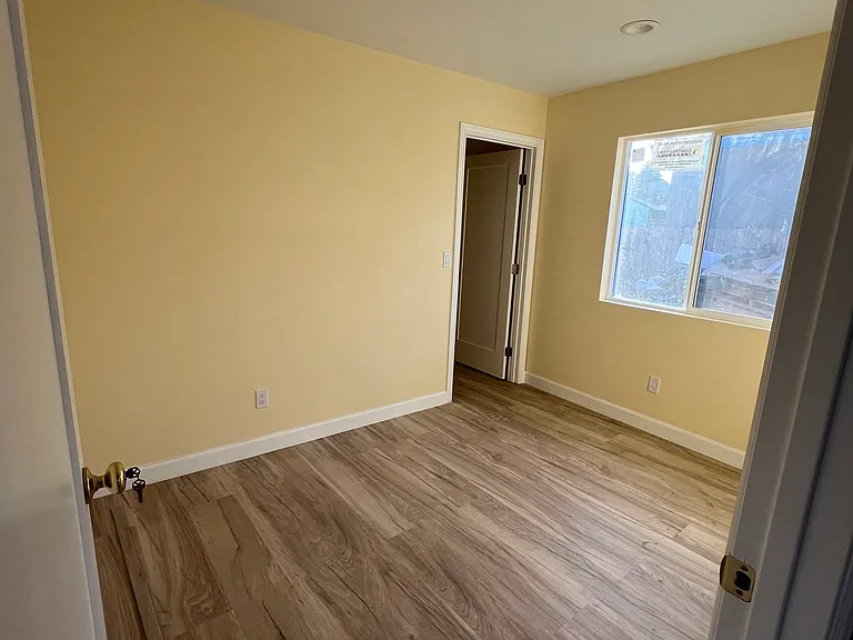 Bedroom with walk-in closet