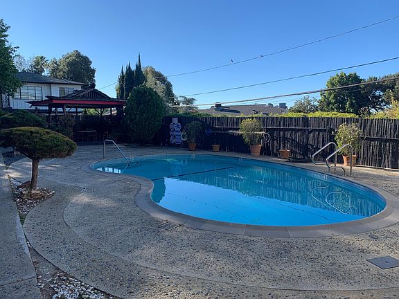 The swimming pool at the center of the property.