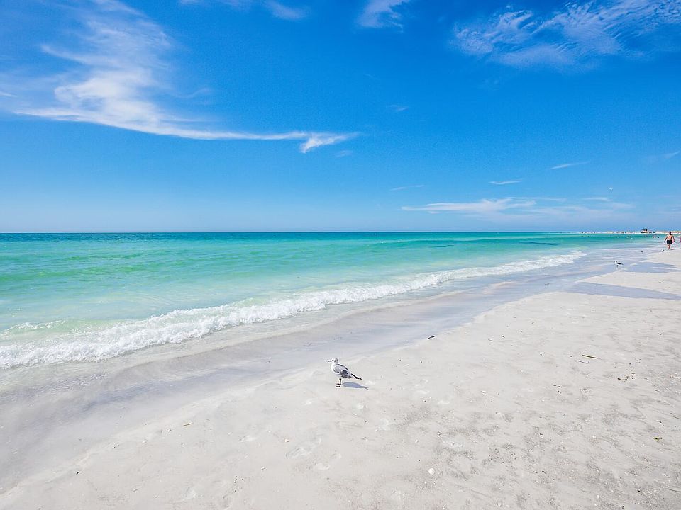 Enjoy a stroll along the beautiful beach just across the street.