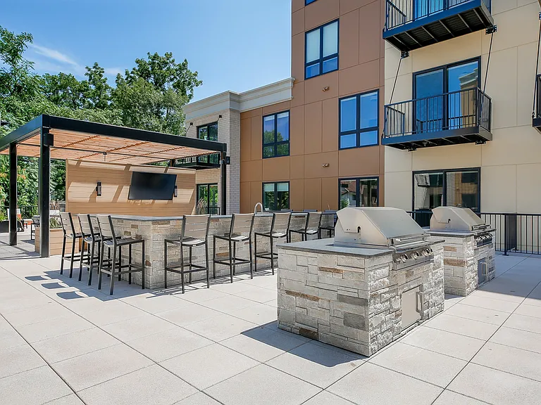 15,000 SF Amenity Deck with firepits, grills, outdoors TV's, bocce court, and pet run