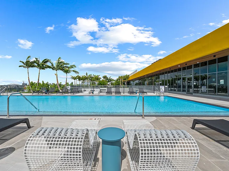 Lounge poolside seating and relaxing rooftop hammocks