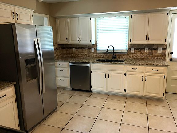 Stainless steel appliances and granite countertops