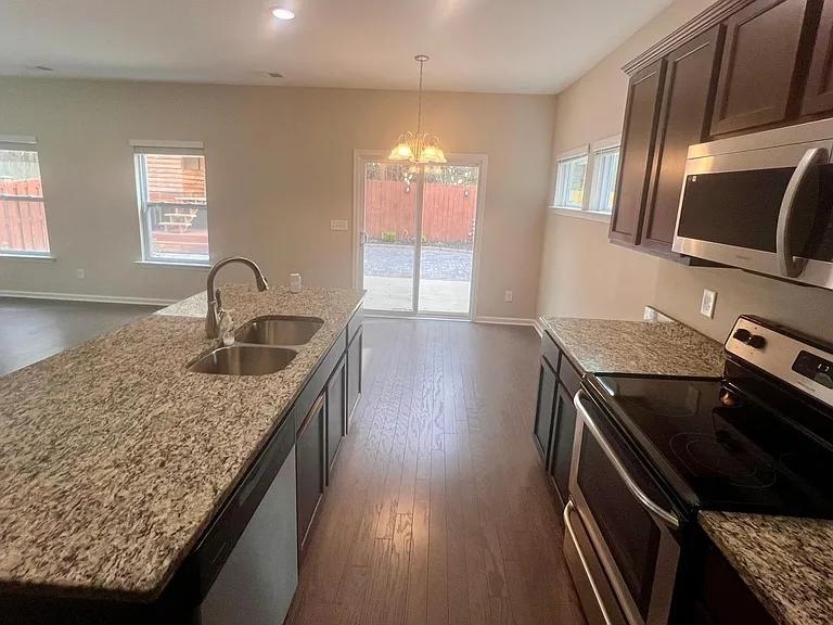 Granite countertops and all appliances included. Stove, Microwave and refrigerator all stainless steel top of the line.