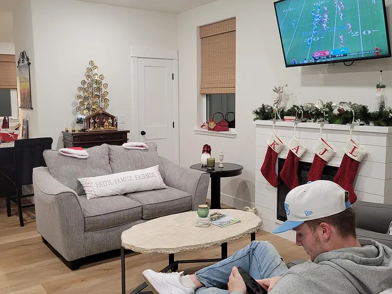 Main floor living room with electric fireplace