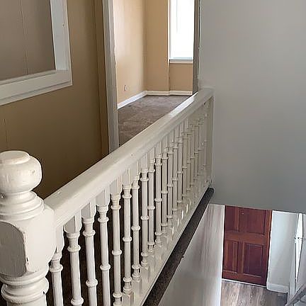 Top of the stairs at entry