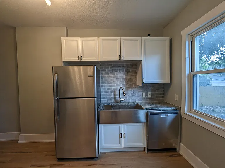 Nearly brand new kitchen with large apron sink