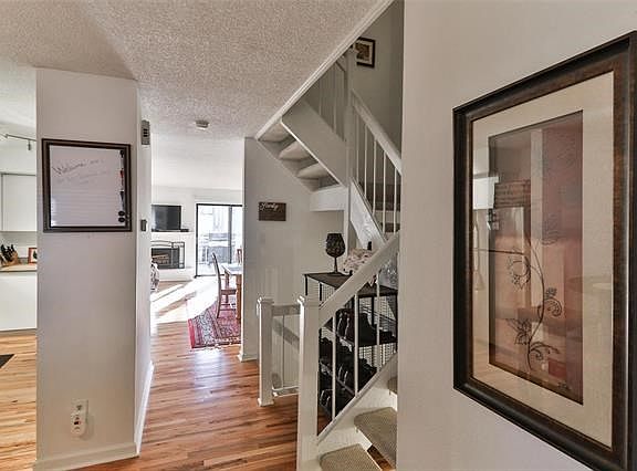 Enter 2030 Painted Leaf.  Fall in love with these beautiful wood floors.  Open and bright townhouse.