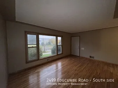 "Charming 2-Bed Gem with Hardwood Floors in Saint Paul's Vibrant Highland Park!" — Photo 2