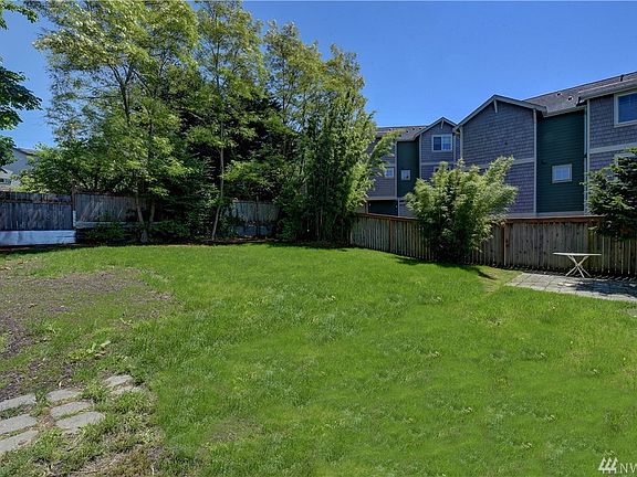 Large, fully fenced, flat backyard to host all your summer BBQ's.