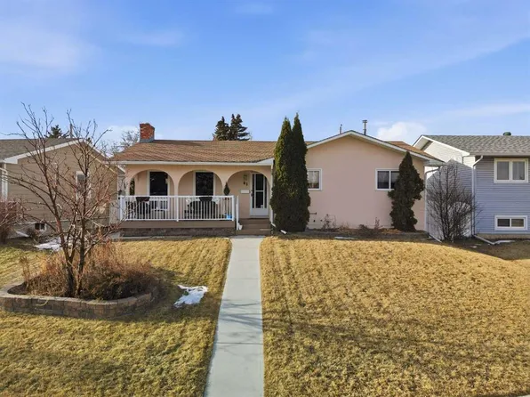 63 E Huntmeadow Rd NE, Calgary, AB T2K 5H2