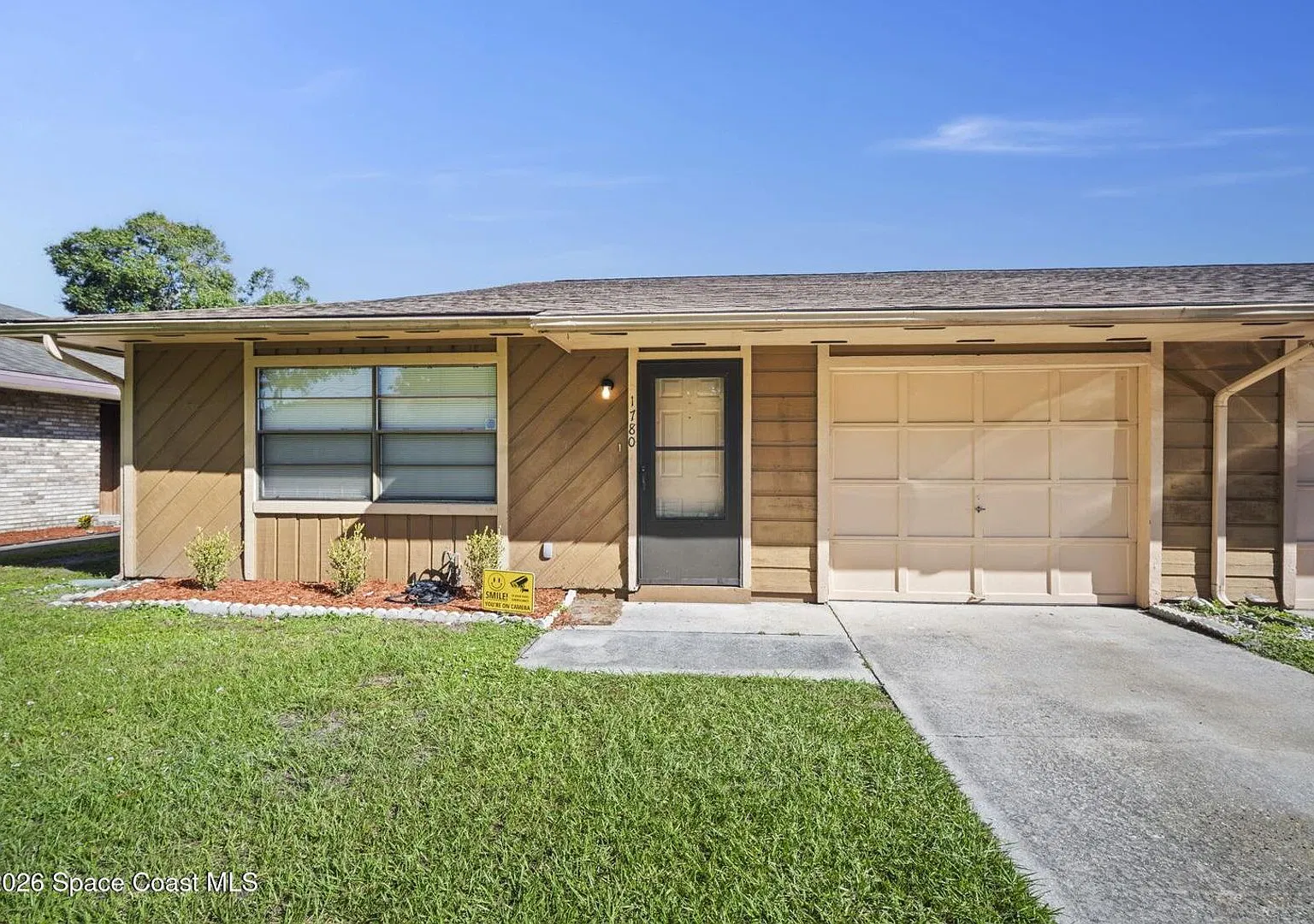 Welcome home to this beautifully updated 3-bedroom, 2-bath half-duplex featuring a one-car garage... — Photo 1