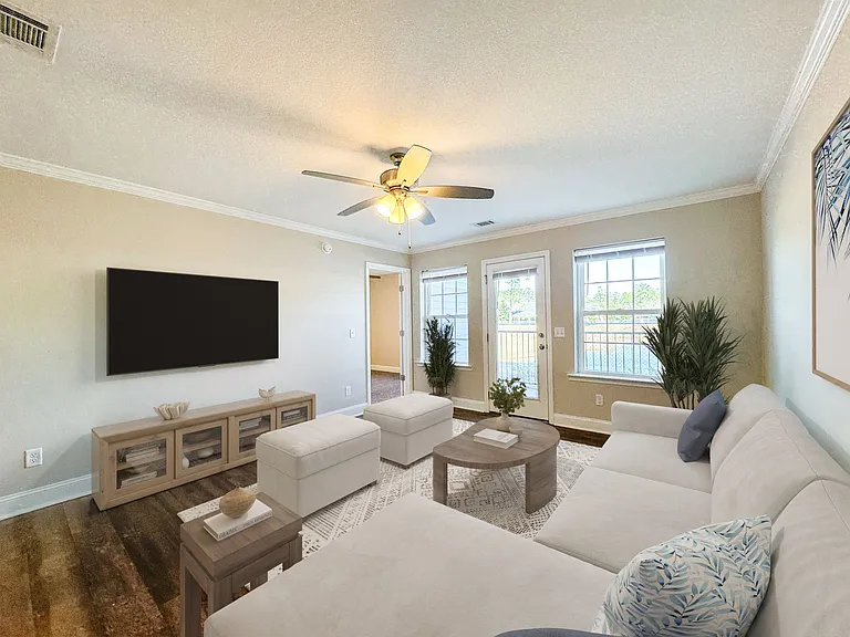 Living room with patio/balcony access