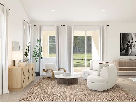 Great room with sliding door to covered patio