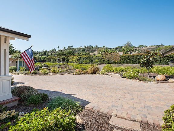 Parking area and serene neighborhood.
