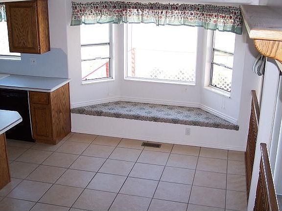 Eat-in kitchen area with bay window