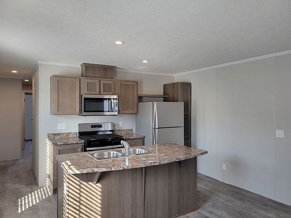 4th image of 38000 Le Chateau Blvd #393