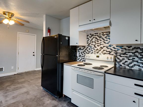 Newly remodeled kitchen: new lights, new cabinets, new tile, new floor