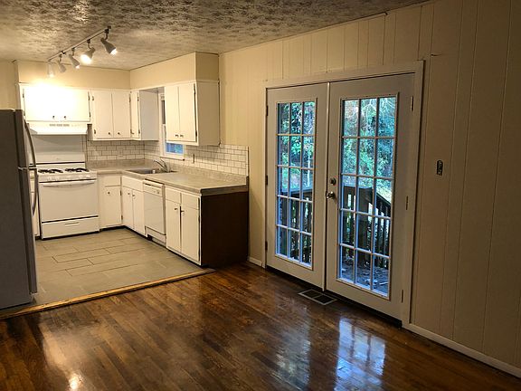 Kitchen opens to separate dining room
