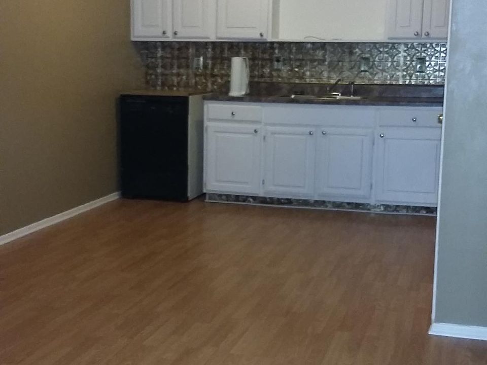 Large kitchen and dining area