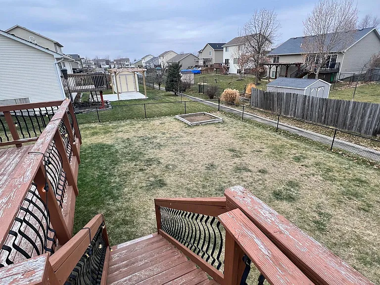Deck Stairs to Fenced Yard