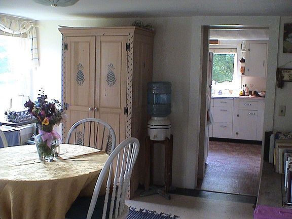 dining room, kitchen in the back