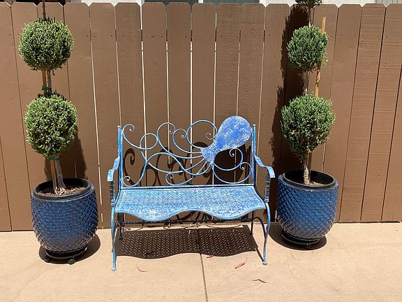 A place to enjoy some sunshine, your favorite beverage, and book.