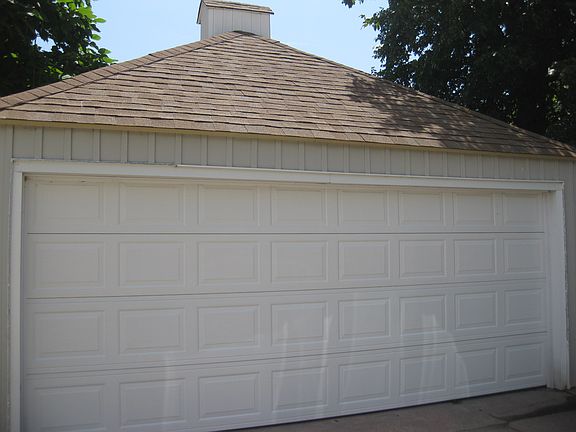 Detached garage behind home