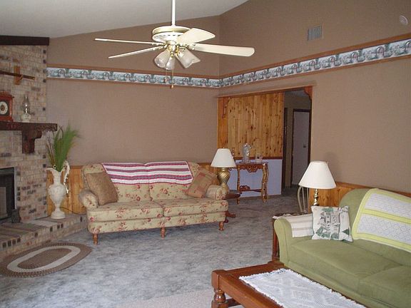 Large family room with stone fireplace