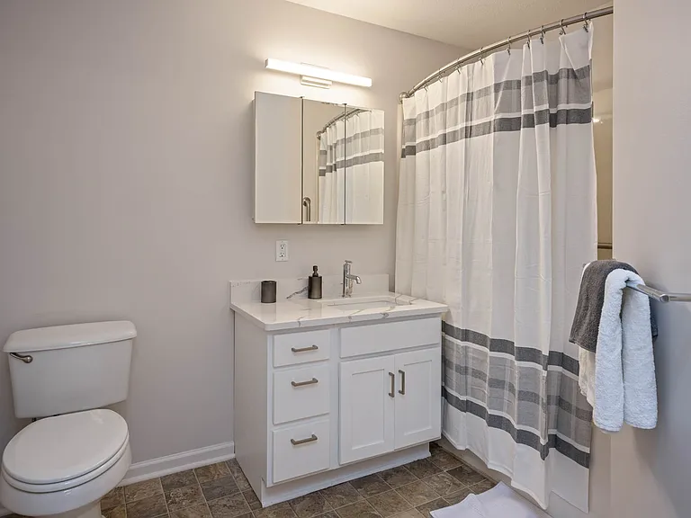 The Village East Apartments — Photo 14