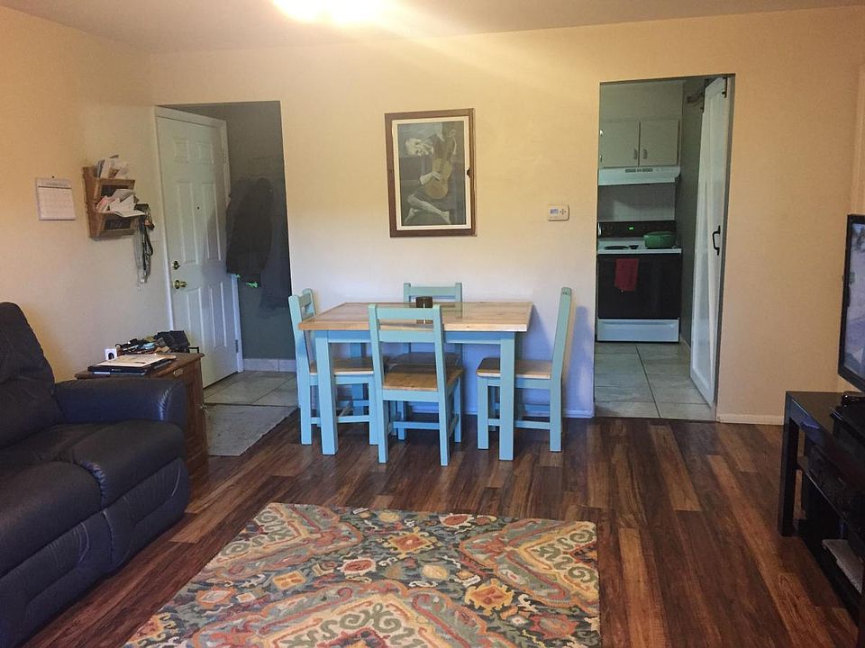 Large family room with wood floors
