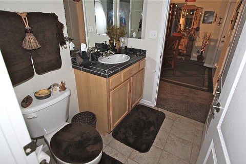 Tile flooring in the kitchen and bathrooms.